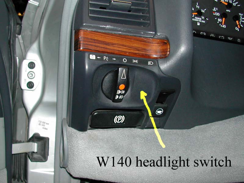 The W140 does not use an escutcheon to cover the mounting for the vacuum 